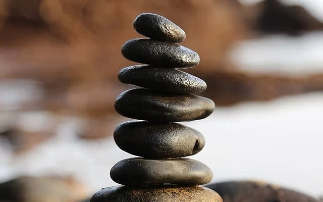 Image des plusieurs cailloux un sur l’autre symbolisant Nos Services Exclusifs 